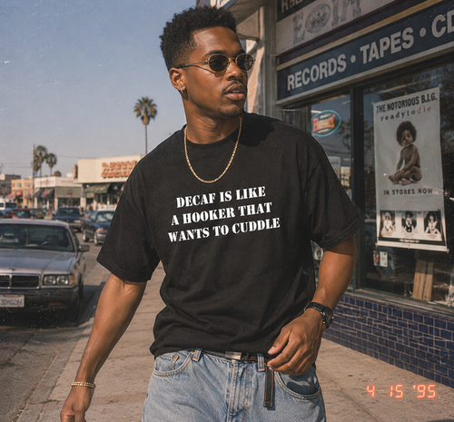 Lifestyle image showing the Decaf Wants to Cuddle Tee front print